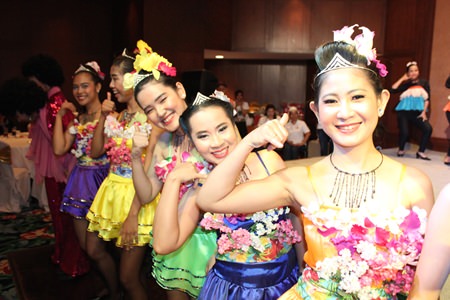 Siam Bayshore and The Bayview hotel employees perform in their Hawaii dresses.