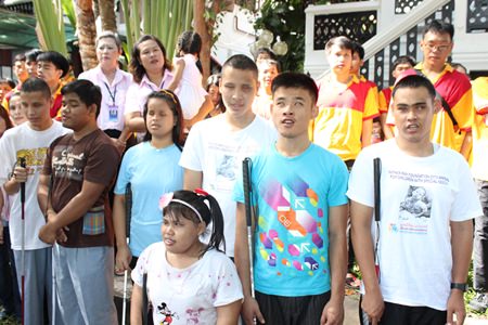 Students, staff and teachers sing “Unsung Hero” and “Father Ray in Our Hearts.”