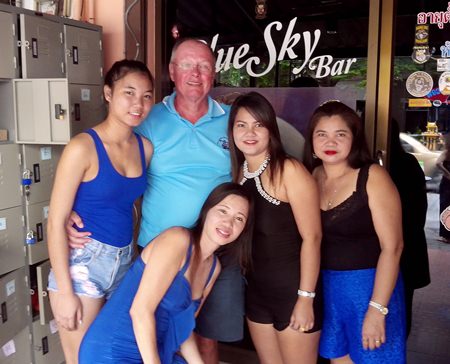 Dan ‘The Diet Whiskey Man’ celebrates his win with the staff at Blue Sky Bar.