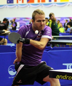 A Danish player overcomes his disabilities to demonstrate his skills at table tennis.