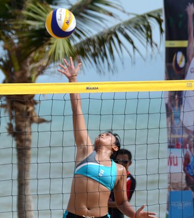 Rising high, a player stretches for the ball in the female third place playoff game.