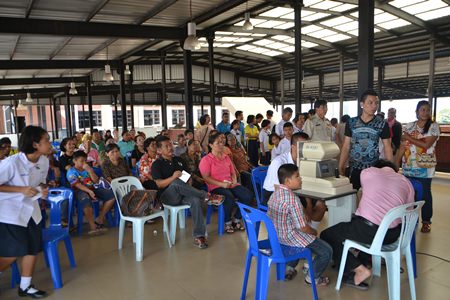 Residents have their eyes tested for free spectacles from the “Relief Supplies for the Disabled 2014” project.