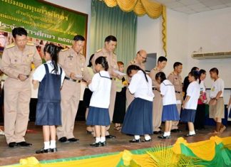 Navy awards 621,000 baht in scholarships Officers at Sattahip Naval Base recently handed out 621,000 baht in scholarships to families of navy personnel.