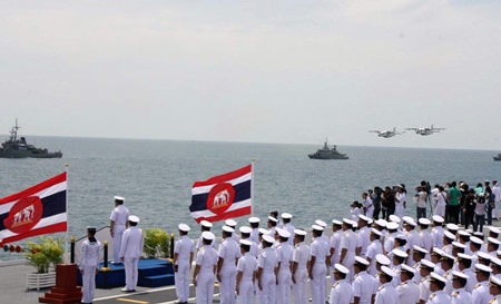 The Royal Thai Navy honored retiring officers, including Navy Commander-In-Chief Adm. Narong Pipatanasai - who is also retiring to become education minister in the Cabinet - with processions on land and sea.