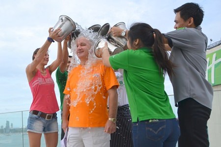 Phil Broad, Vice President of Food & Beverage, Asia, Middle East and Africa of the Intercontinental Hotels Group, held the ALS Ice Bucket Challenge on the rooftop of the new Executive Building of the Holiday Inn Pattaya, where he soaked himself with a bucket of ice cool water.