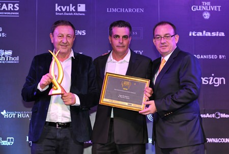 (L to R) Rony Fineman and Kobi Elbaz receive their award from Thailand Property Awards judge Mark Bowling.