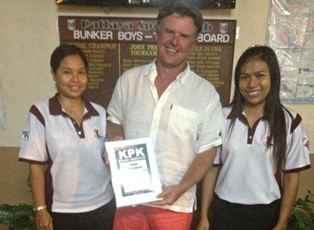 Colin Greig receives the KPK voucher from The Ranch girls.
