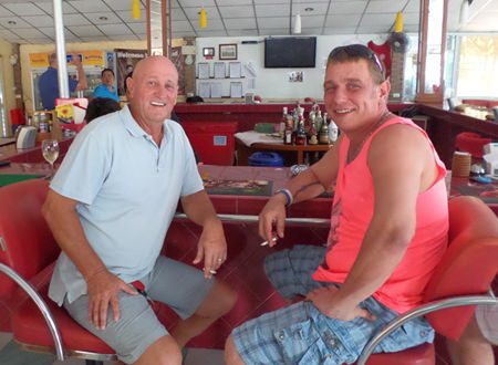 Alan and Mal chat it up after a good day at Burapha.