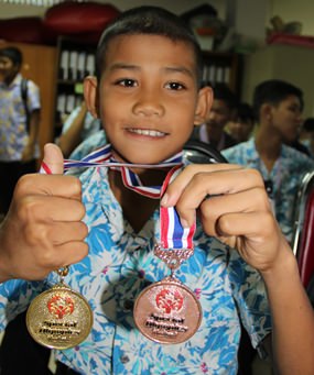Cerebral palsy did not stop this young boy winning two medals in the athletics.