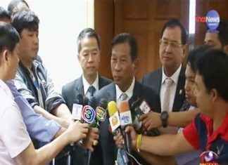 Commerce Minister Gen Chatchai Sarikulya speaks to the press.