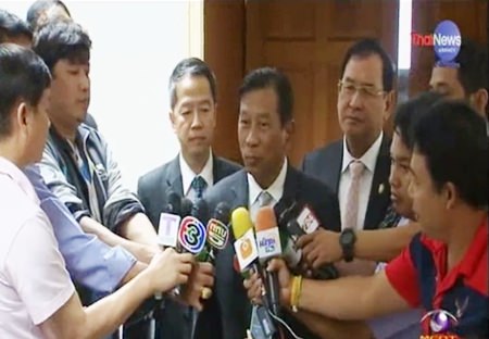 Commerce Minister Gen Chatchai Sarikulya speaks to the press.