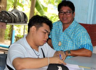 A protective father keeping an eye on his son.