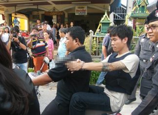 Police brought out Thanachart Chaichana to reenact his shooting of two teenagers after they left an all-night pub in Pattaya.