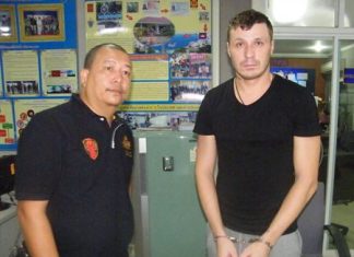 Russian fugitive Andrey Tsirp (right) has been arrested in Pattaya and will be deported to face robbery charges in his homeland.