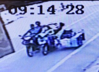 Grainy CCTV footage catches images of two young Thai men stealing a thin gold chain from a disabled woman in central Pattaya.