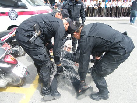 Police recruits learned suppression techniques during a training session in Pattaya.