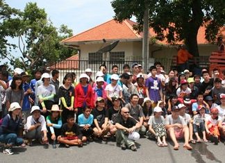 The cleaning crew takes a break after a hard day’s work picking up trash, discarded by inconsiderate people, around Pratamnak Hill.