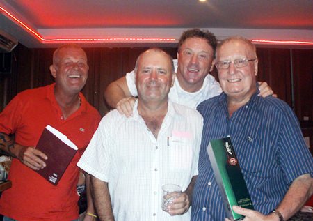 Sunday winner Bob Watson (center) celebrates with Freddy, Paul and Jim.