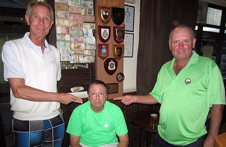 Walter Baechli (left) and Bob Watson (right) accuse Tom Herrington (center) of stealing first place at Greenwood.