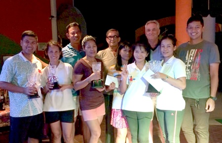 Pairs champions and finalists pose with their trophies.