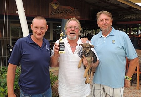 Tony Aslett (centre) celebrates his victory on Friday flanked by Greg Hirst (sponsor left) and the runner up, Peter LeNoury.