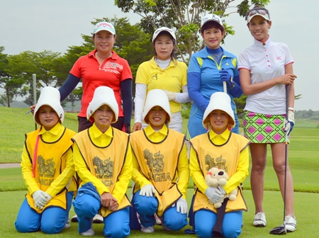 Caddy girls pose for a photo at the Singha Amazing Thailand Caddy Championship 2014.