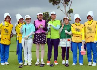 Female golfers line up at the Singha Amazing International Caddy Championship 2014 held at Siam Country Club in Pattaya on Oct. 6.