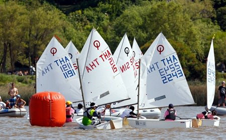 Thailand and Singapore Optimists battle for position on the Rio De La Plata in Buenos Aires, Argentina. (Photo/Matias Capizzano)