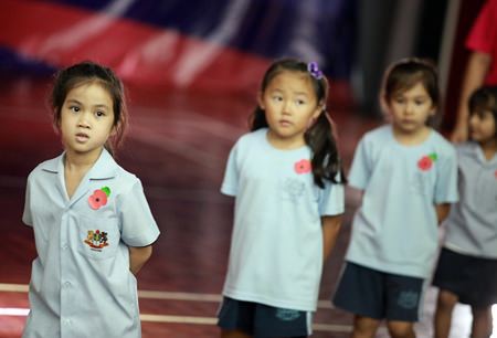 Students from GIS wore poppies to remember the victims of war.