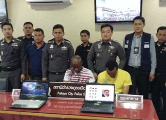 Suspected Nigerian Internet scammers arrested in Pattaya Police bring out for the media Nigerian scammers Chigozie Nnamdi Nwaogu and Onyebuchi Uchegbu.