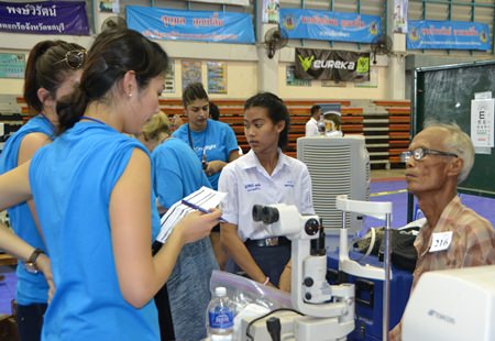 Opticians from OneSight Foundation in America provide free eye checkups during the event.
