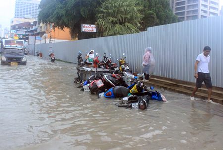The current was too much for these parked motorbikes.