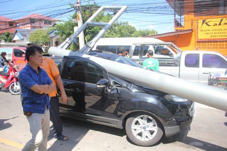 A 78-year-old British man was lucky to escape with his life when a street pylon smashed into the driver’s side of his new Ford during an accident involving a runaway crane on North Pattaya Road.