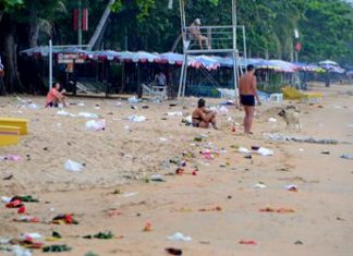 Jomtien Beach was littered with floats, balloons, discarded bottles, bags and food containers left behind by revelers.