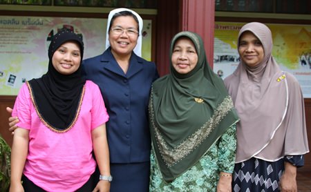 Sister Pavinee greets the mothers who travelled to Pattaya with their children.