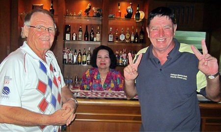 Winners Derek Brook (left) and John Hackett (right) celebrate with Lek at BJ’s Holiday Lodge.