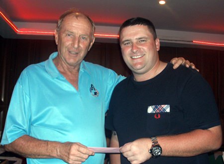 Adam Barton (right) with Lewiinski’s golf manager Colin Davis.