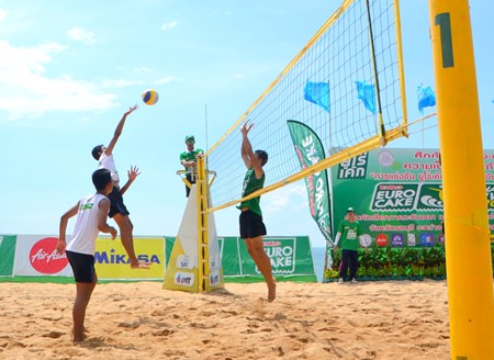 Youth beach volleyball players in action at the Euro Cake Thailand Beach Volleyball 2014 finals on Jomtien Beach, Monday, November 3.