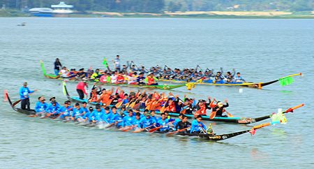 Long boats compete head to head in a 30-oar category race on Lake Mabprachan, Sunday, November 23.
