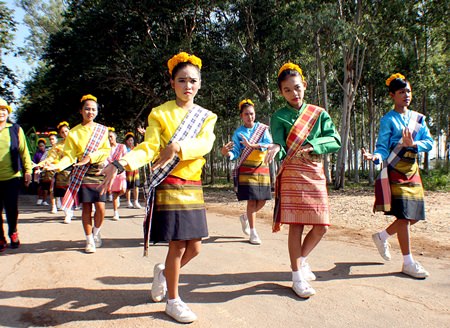 Dancers in traditional costume accompanied the buffalos on a pre-race parade.