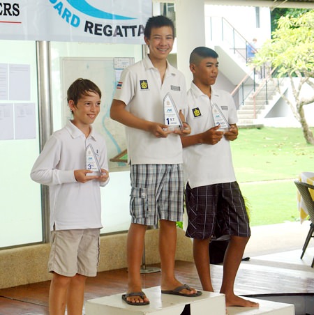 The JVK International Movers Eastern Seaboard Regatta top three stand on the podium, from left: Quentin Uhrich, Alex Frefel and Phomraphi Thapthim.