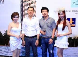 Saksit Teerapornsathanon (2nd left) and Suriwat Rermkitkarn (3rd left), deputy managing directors of the Urban Property, pose for a photo during the Aeras Condominium ‘thank-you’ party on November 25.