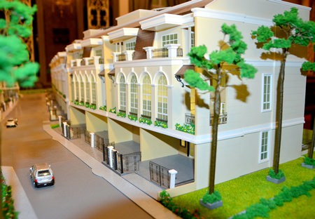 A scale model shows a typical design of the project’s town homes.