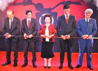 VIP members cut the ribbon (L to R) Silvano Fini, Production Director of Ducati Motor Thailand; Francesco Milicia, Managing Director of Ducati Motor Thailand; Atchaka Sibunruang, Permanent Secretary of the Ministry of Industry; Pierfrancesco Scalzo, Manager of Sales & Marketing of Ducati Motor Thailand; and Francesco Nisio, Italian Ambassador to Thailand on the official opening day of Ducati Motor Thailand in Amata City, Rayong.