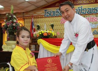 Father Peter presents the certificates.