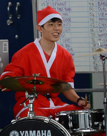 A Year 11 drummer at the Christmas Fun Day.