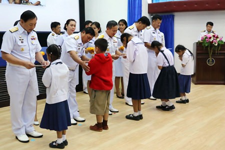 Admiral Pichan Dhiranetra, commander-in-chief of the Royal Thai Fleet, presided over the Dec. 19 presentation of scholarships to children of navy families to mark the 91st anniversary of the Royal Thai Fleet.