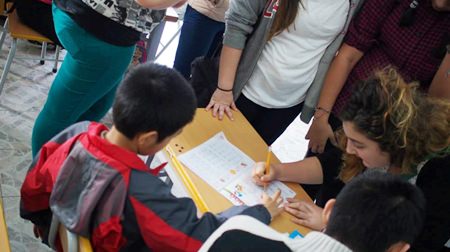Students went into schools to help the local children.