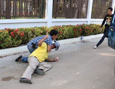 Police arrest drug dealing suspect Surapong Puangnak in a dramatic takedown.