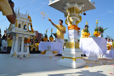 Mayor Itthiphol Kunplome leads the inauguration of the Brahman shrine with accompanying joss house and spirit house at city hall.